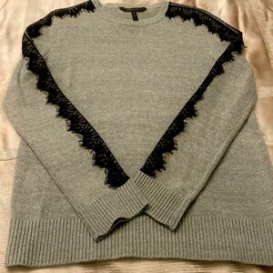 Grey crew neck sweater. 60% cotton 40%acrylic.